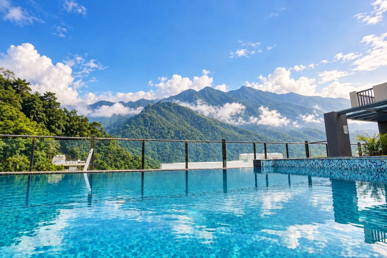 Rooftop infinity pool at Roots & Peaks facing the Himalayan foothills