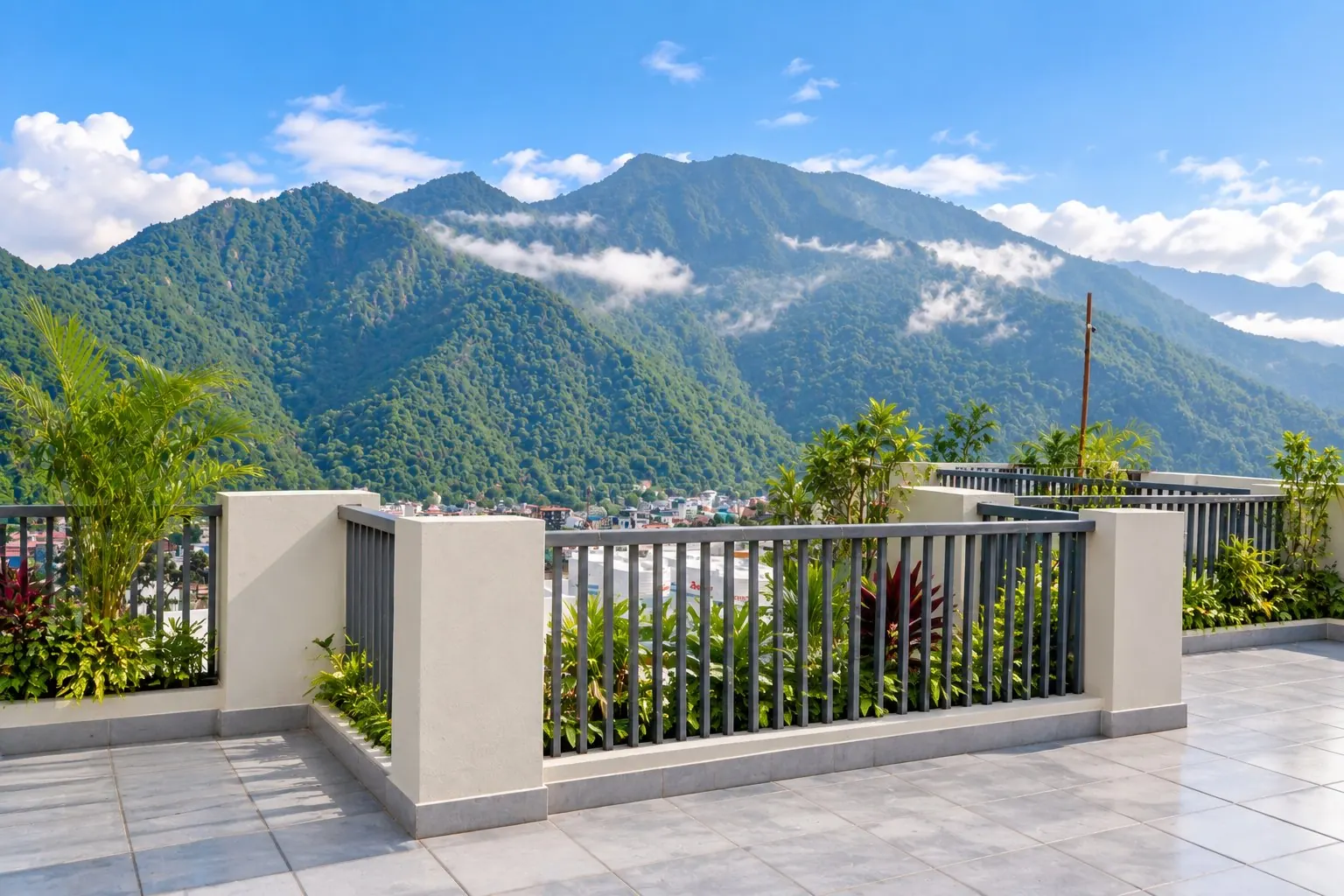 Terrace at Roots & Peaks with views of the Tapovan hills