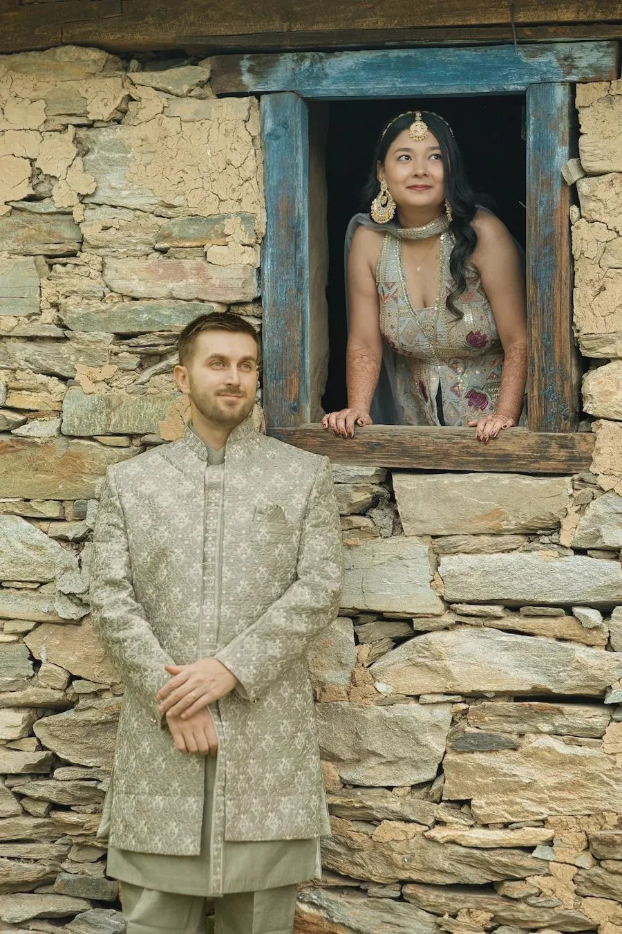Couple framed in a traditional mountain home